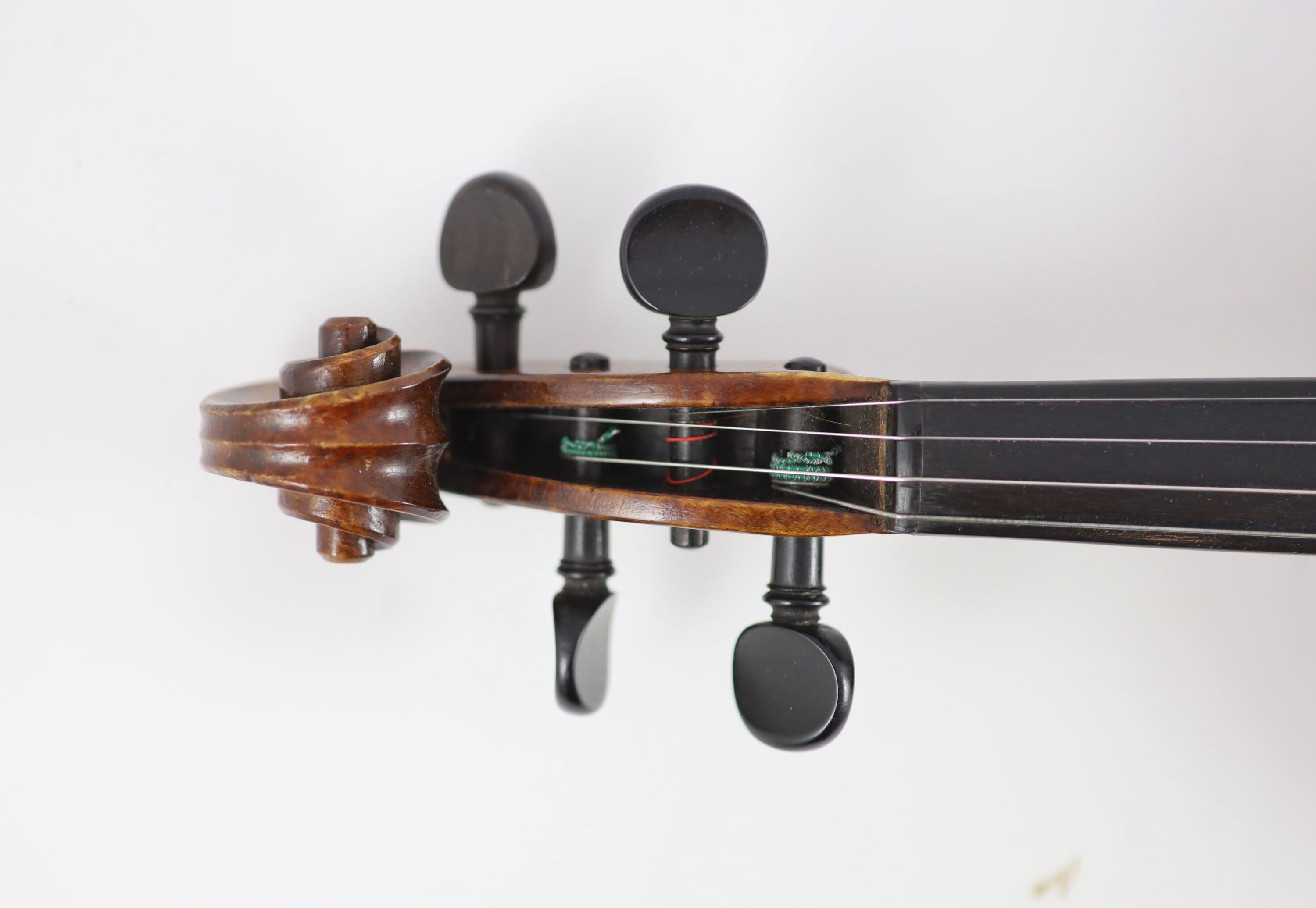 A violin, labelled Georges Cunault / luthier/ 21, Rue de Navarin, Paris An 1900, Length of back 36 cm